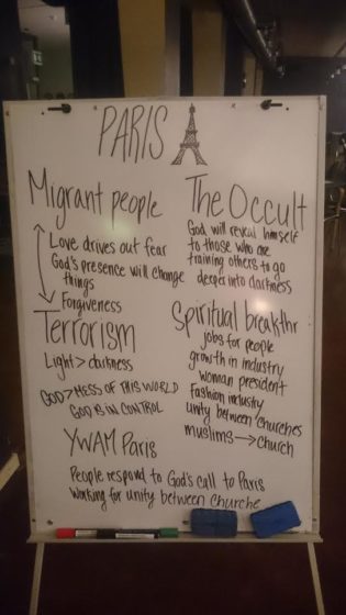 Paris prayer white board - "Migrant People, Terrorism, The Occult, YWAM Paris, Spiritual Breakthrough".